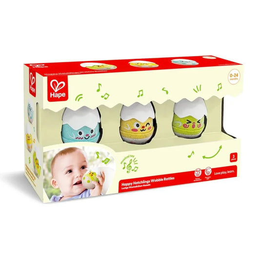 Sonajeros tentetieso Polluelos musicales Conoce a los emocionantes huevos! Un conjunto de 3 sonajeros tambaleantes adorables con distintas expresiones faciales. Estos expresivos compañeros cautivan a los bebés con sus encantadoras sonrisas, fomentando la curiosidad y el carácter juguetón.