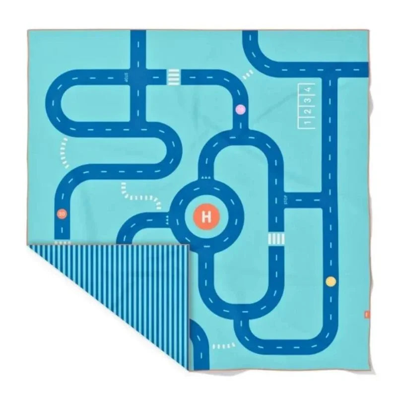 Toalla reversible microfibra Juego Equilibrio XL lifestyle toalla antiarena quut.jpg