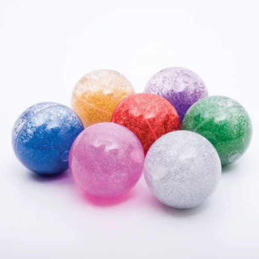 Set de Bolas Sensoriales Rainbow Glitter – 7 unidades 🌈✨
Edad recomendada: +18 meses
Dimensiones: 6,5 cm de diámetro
Incluye: 7 bolas sensoriales (roja, plateada, dorada, verde, azul, rosa y violeta)