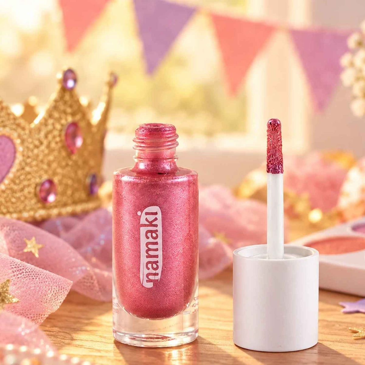 Compra el Gel Glitter Rosa de Namaki para niños. Purpurina ecológica y segura para rostro y cuerpo, fácil de aplicar y de retirar con agua y jabón. ¡Brillo mágico sin tóxicos!