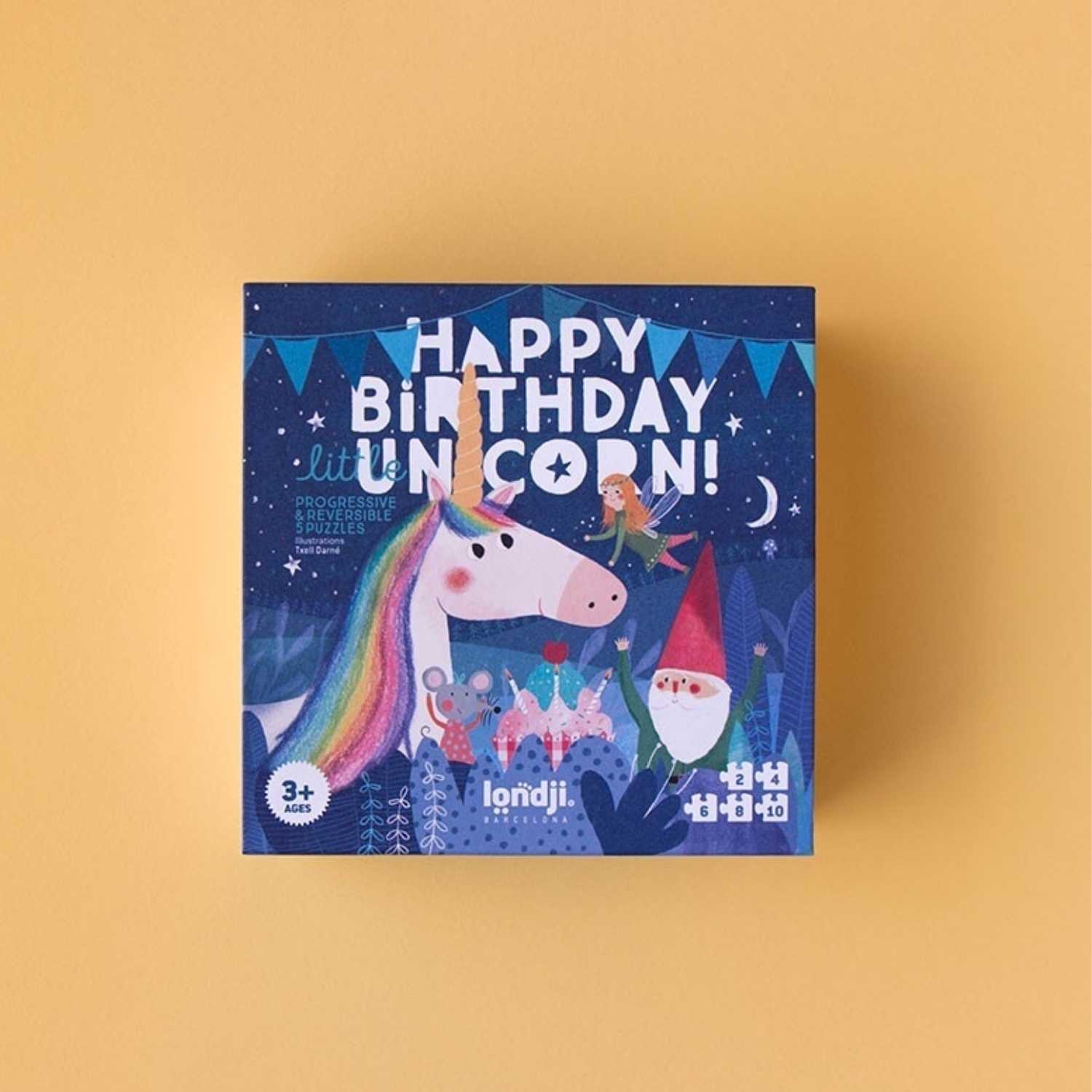  Puzzle Happy Birthday Unicorn de Londji! Este set de puzzles para niños pequeños es la herramienta ideal para introducir a los más curiosos en el mundo de los rompecabezas. A través de sus piezas de gran calidad, los niños acompañarán al unicornio y al duende en una aventura inolvidable.