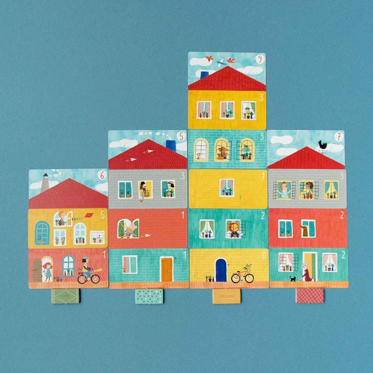Descubre Card Game - HOME, SWEET HOME!, el juego de cartas de cálculo mental para construir casas a partir de 7 años. Fabricado en Barcelona con papel FSC.