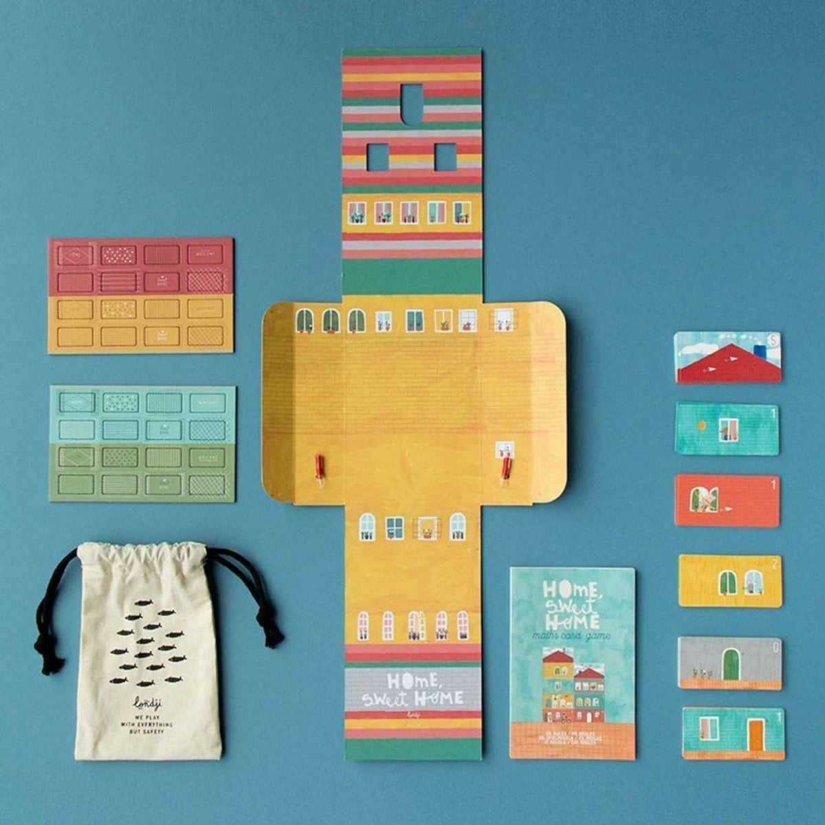 Descubre Card Game - HOME, SWEET HOME!, el juego de cartas de cálculo mental para construir casas a partir de 7 años. Fabricado en Barcelona con papel FSC.