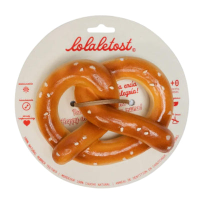 Consigue el mordedor de caucho natural Pepe le Pretzel en www.manodesantaoficial.es. Juguete de dentición ecológico, seguro y sin agujeros para bebés, ideal para el baño y el estímulo sensorial.