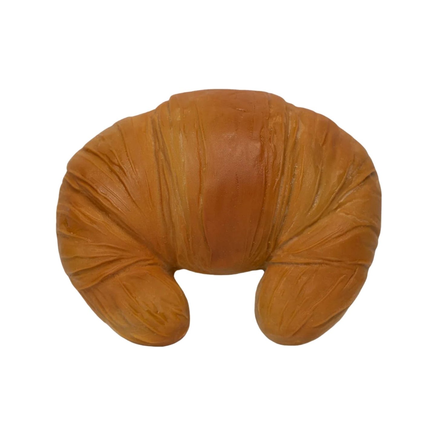 Consigue el mordedor de caucho natural Sam le Croissant en www.manodesantaoficial.es. Juguete de dentición ecológico, seguro y sin agujeros para bebés, ideal para el baño y el estímulo sensorial.