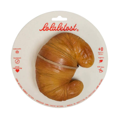 Consigue el mordedor de caucho natural Sam le Croissant en www.manodesantaoficial.es. Juguete de dentición ecológico, seguro y sin agujeros para bebés, ideal para el baño y el estímulo sensorial.