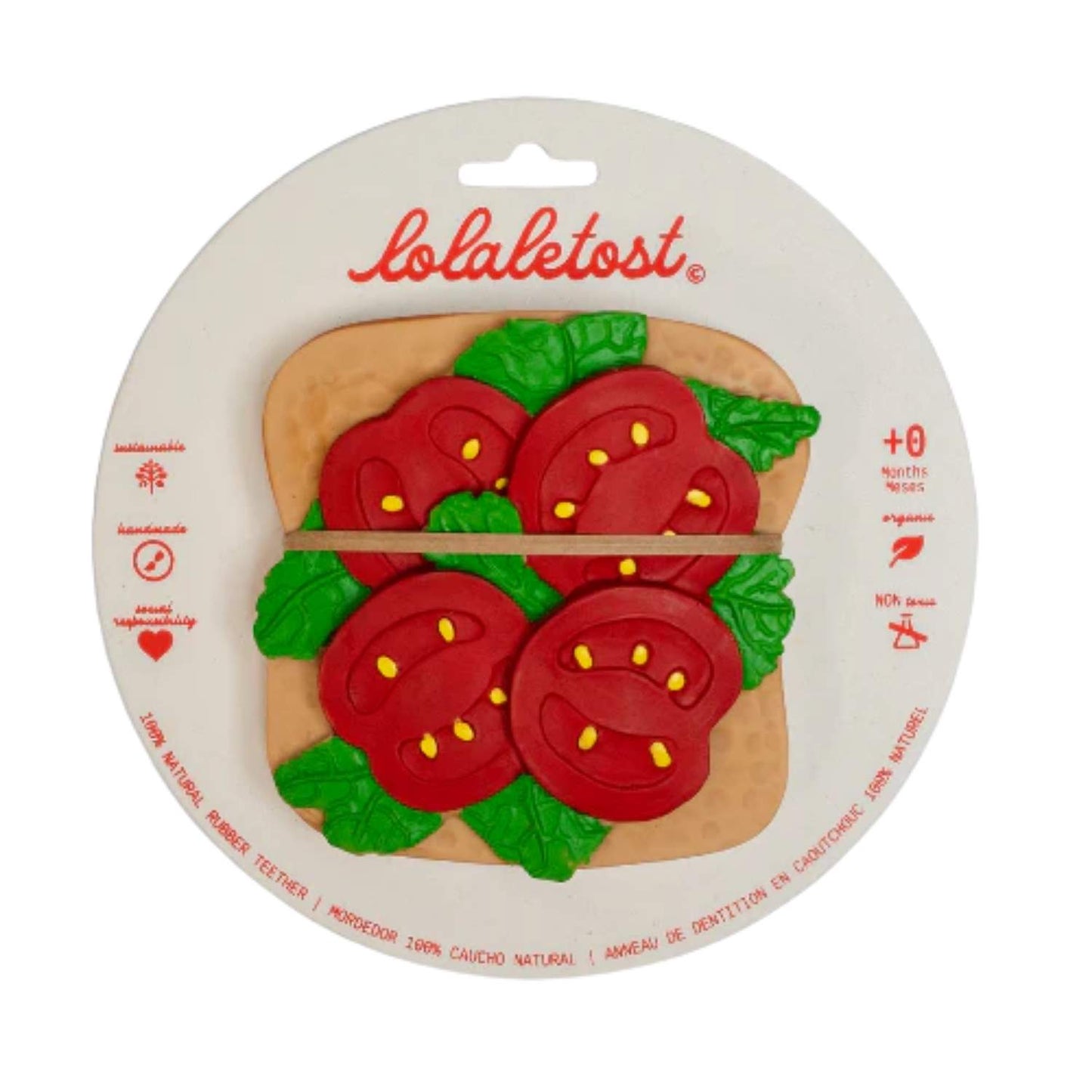 Mordedor en forma de Tostada con Tomate. Diseñado especialmente para las manos más pequeñas, es un accesorio ligero, blando y muy fácil de agarrar. Al no tener agujeros, se convierte en un juguete todoterreno súper seguro que tu bebé podrá usar también en la bañera, como elemento sensorial o para decorar su habitación. Encuentra los mordedores más divertidos y seguros en nuestra tienda online www.manodesantaoficial.es.