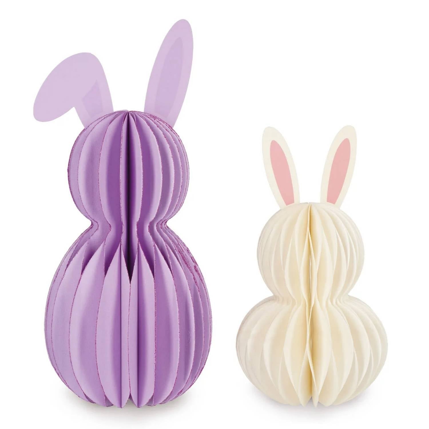 Compra el Set de 2 Conejitos Plegables de Papel Hoppy Easter de Legami. Con cierre magnético, efecto nido de abeja y detalles de purpurina. La decoración de Pascua perfecta y fácil de guardar.