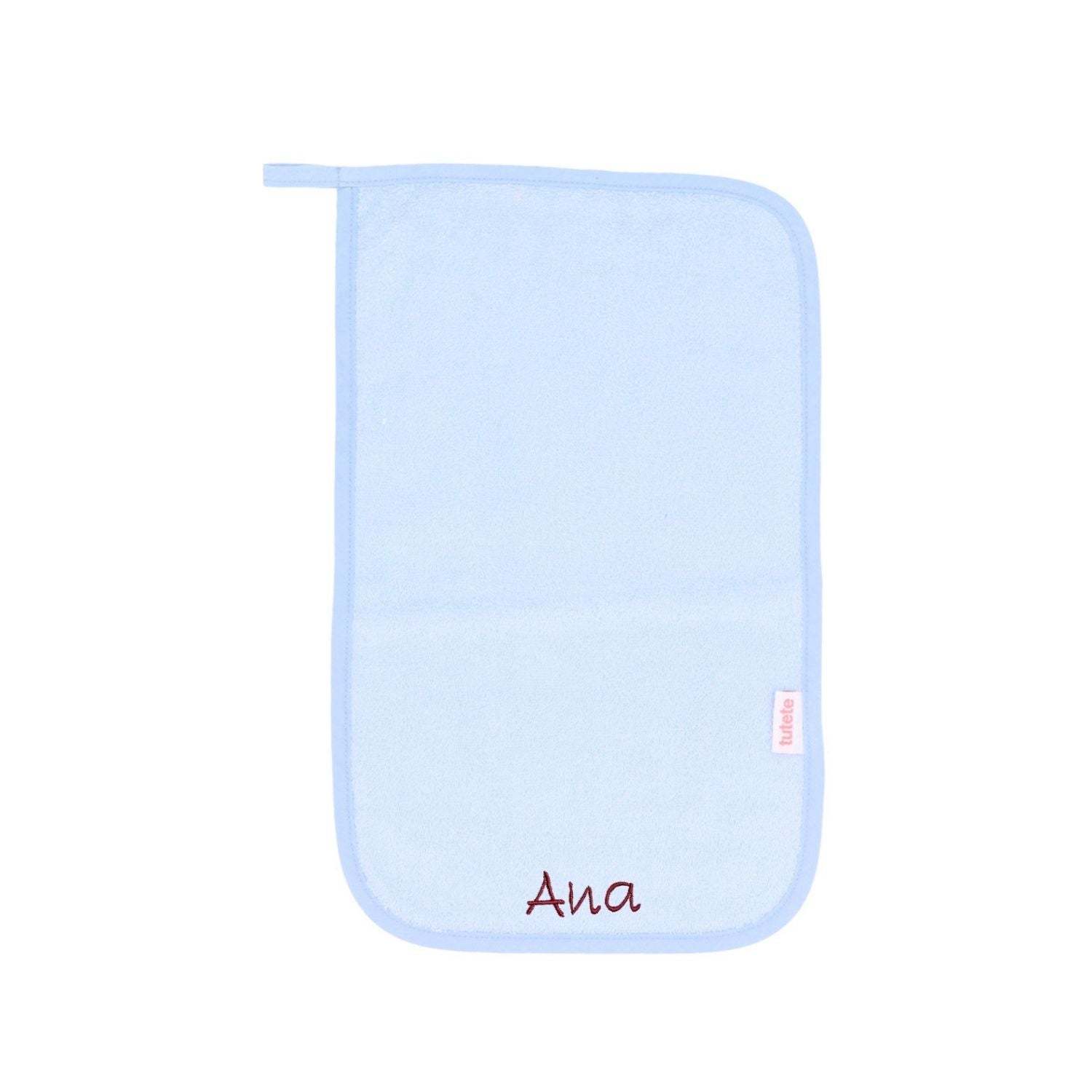 Compra la toalla escolar personalizable Blue Tutete en Mano de Santa. Toalla escolar de rizo 100% algodón con cinta para colgar y nombre bordado, perfecta para la vuelta al cole.
