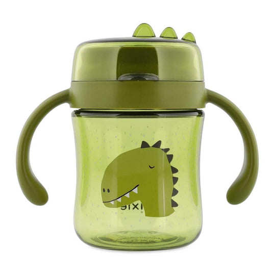 Descubre el Vaso Anti-derrame 360 Dino de Trixie. Taza de aprendizaje con asas en Tritan™ resistente. Ideal para que los niños beban solos sin manchas ni fugas.