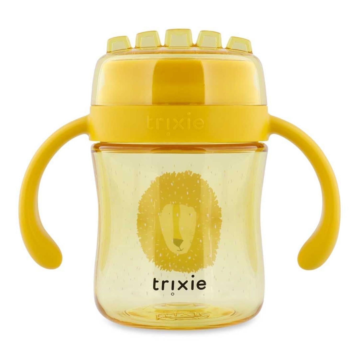 Consigue el Vaso Anti-derrame 360 León de Trixie. Taza de aprendizaje infantil con asas, hecha de Tritan™ resistente. Perfecta para beber de forma autónoma y sin derrames.