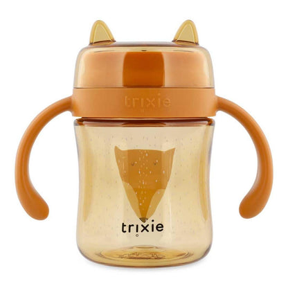 Compra el Vaso Anti-derrame 360 Zorro de Trixie. Taza de aprendizaje con asas en Tritan™ resistente. Ideal para que los niños aprendan a beber de forma autónoma y sin goteos.