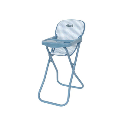 Trona plegable para muñecas de hasta 45 cm. Estructura de metal resistente, ligera, fácil de guardar y con asiento lavable a 30 ºC. ¡Hora de comer jugando!