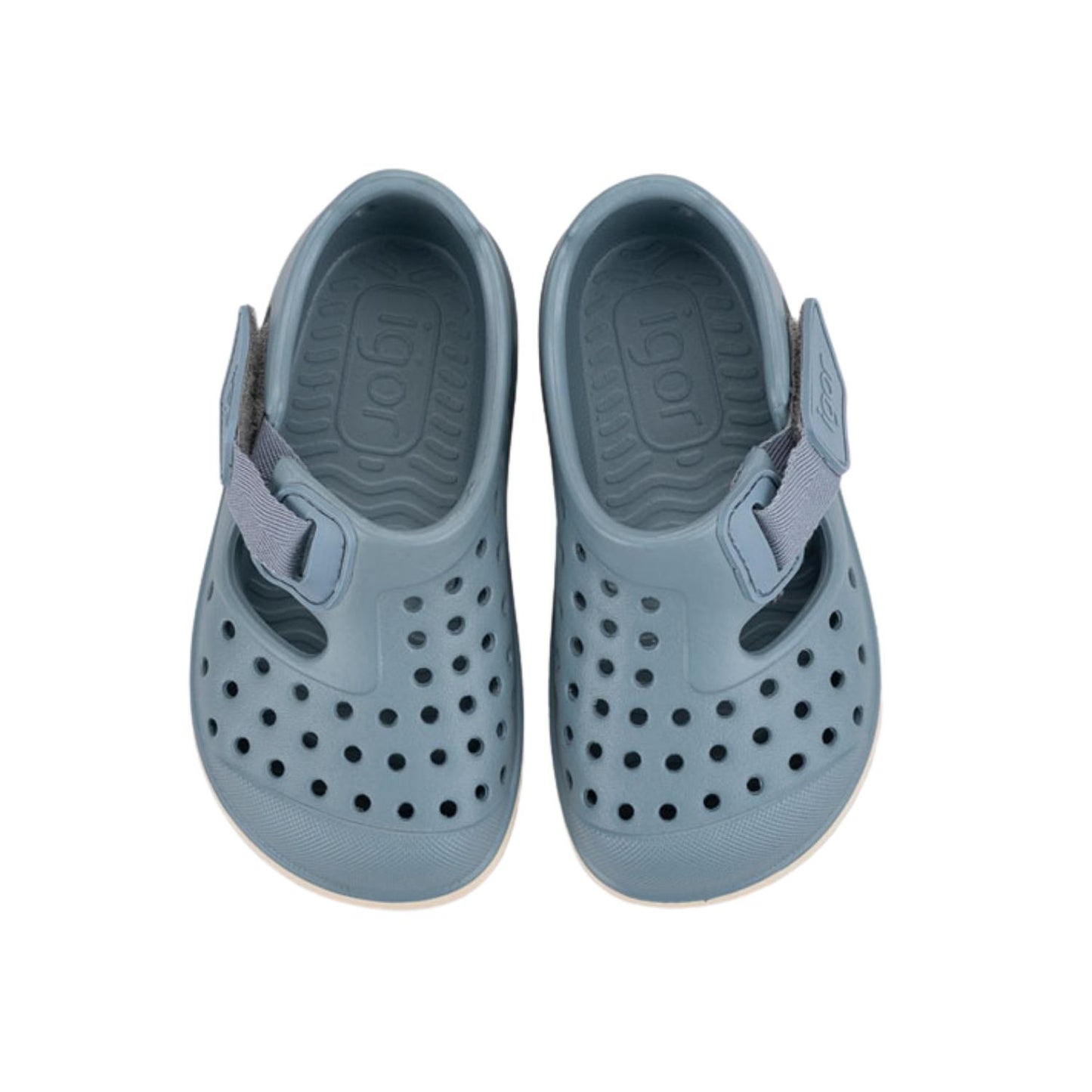 Descubre las zapatillas de agua Malibu Maquillaje, el calzado infantil perfecto para combinar estilo y salud podológica. Fabricadas en E.V.A. de alta calidad, estas cangrejeras destacan por su ligereza y resistencia. Su diseño barefoot medium con cero drop asegura que el talón y la puntera estén a la misma altura, fomentando un desarrollo óptimo del pie