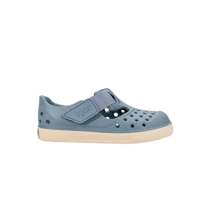 Descubre las zapatillas de agua Malibu Maquillaje, el calzado infantil perfecto para combinar estilo y salud podológica. Fabricadas en E.V.A. de alta calidad, estas cangrejeras destacan por su ligereza y resistencia. Su diseño barefoot medium con cero drop asegura que el talón y la puntera estén a la misma altura, fomentando un desarrollo óptimo del pie