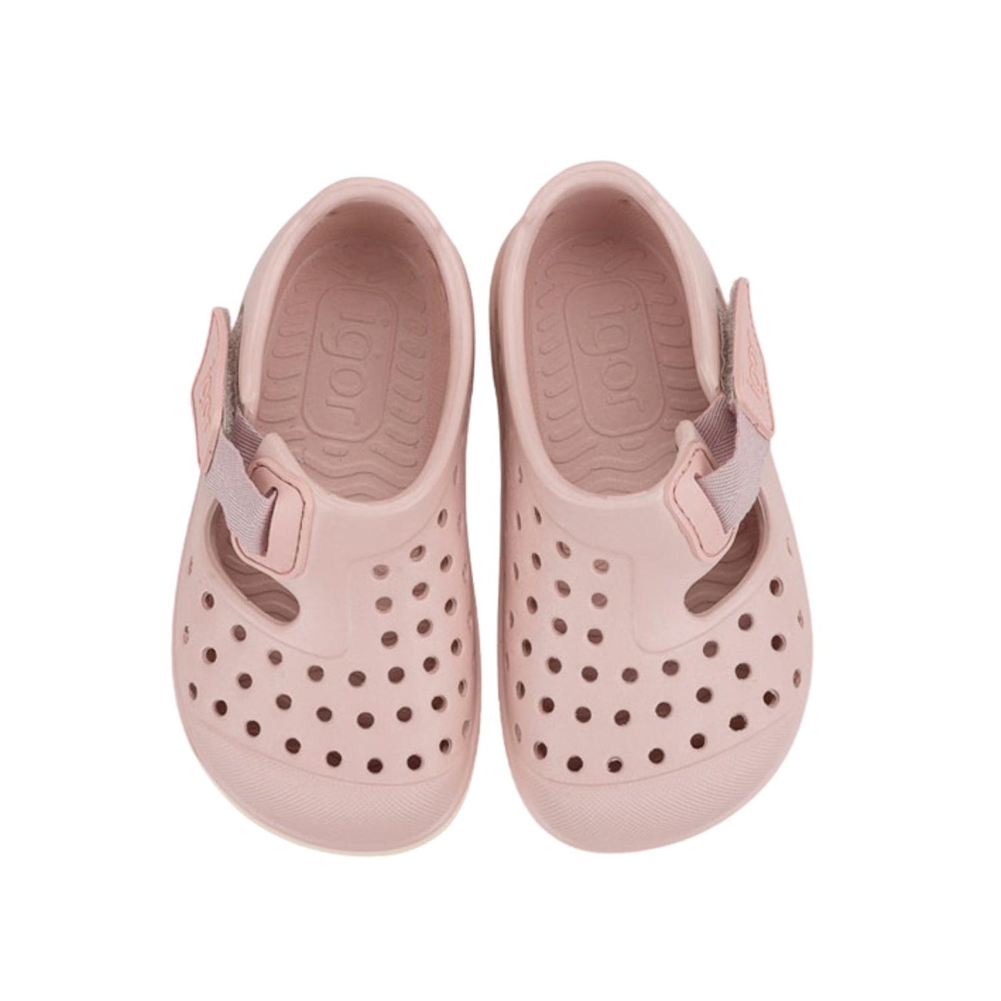 Descubre las zapatillas de agua Malibu Maquillaje, el calzado infantil perfecto para combinar estilo y salud podológica. Fabricadas en E.V.A. de alta calidad, estas cangrejeras destacan por su ligereza y resistencia. Su diseño barefoot medium con cero drop asegura que el talón y la puntera estén a la misma altura, fomentando un desarrollo óptimo del pie