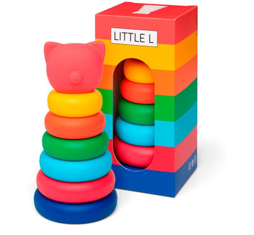 caja del pacaking cerdito apilable de Little L! Está hecho de discos de silicona grado alimentario son coloridos, suaves al tacto y seguros para tu bebé