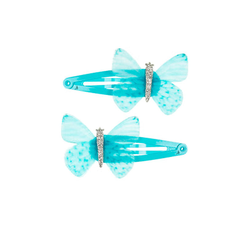 Este set contiene dos pinzas para el pelo, bellamente adornadas con mariposas brillantes en color mini.