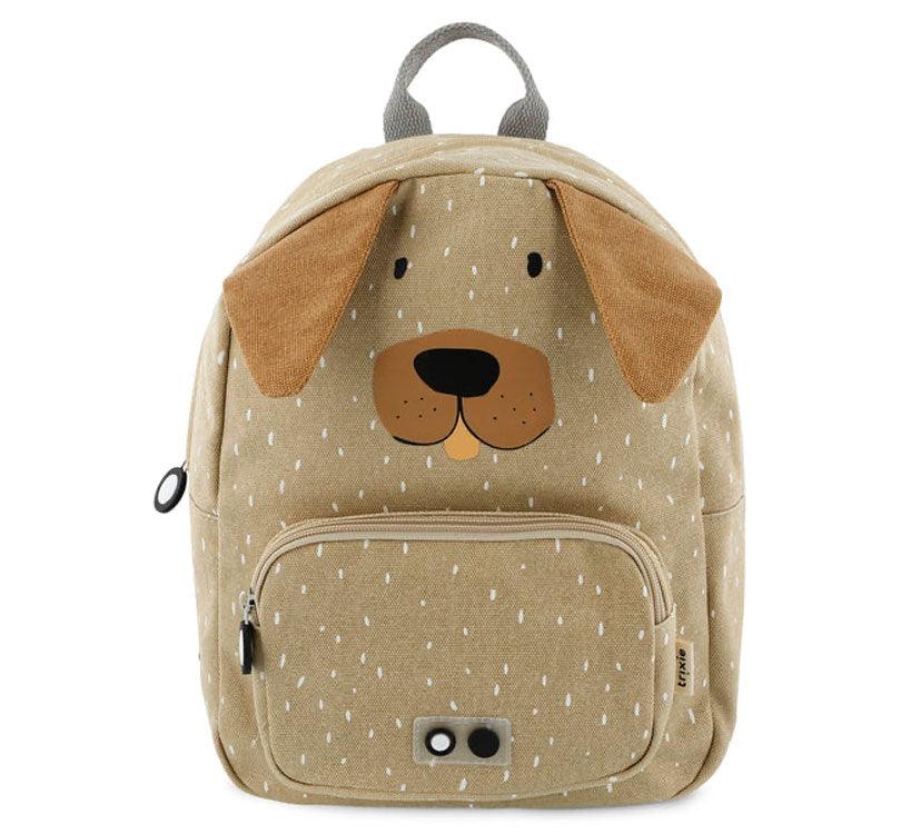 modelo perro pequeño trixie Esta mochila con forma de adorable perrito, con su carita impresa y sus  adorable orejas, conquistará el corazón de vuestros peques. Sus asas acolchadas y ajustables brindan comodidad en cada paso, mientras el cierre con clip en el pecho evita cualquier percance. color beige tostado