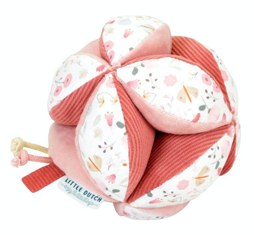 bola de agarra sensorial o pelota montessori de la colección flores y mariposas de la marca Little Dutch en colores rosas y con estampados de flores 