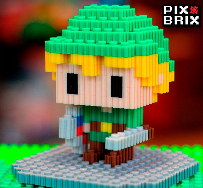 ejemplo para hacer un muñeco de Zelda con caja plastica transparente que contiene 1500 piezas de Pix Brix multicolor